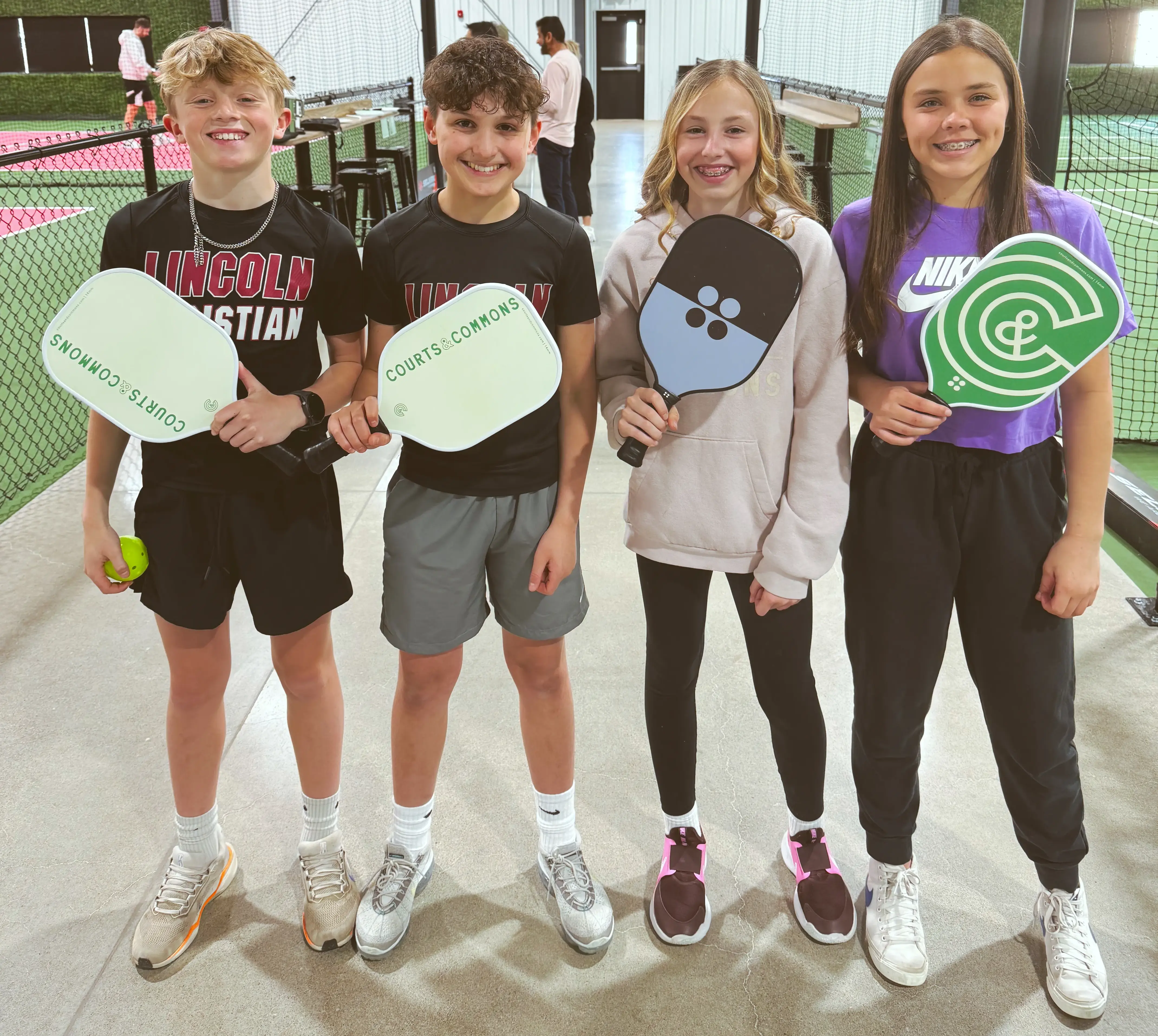 Kids playing pickleball at camp