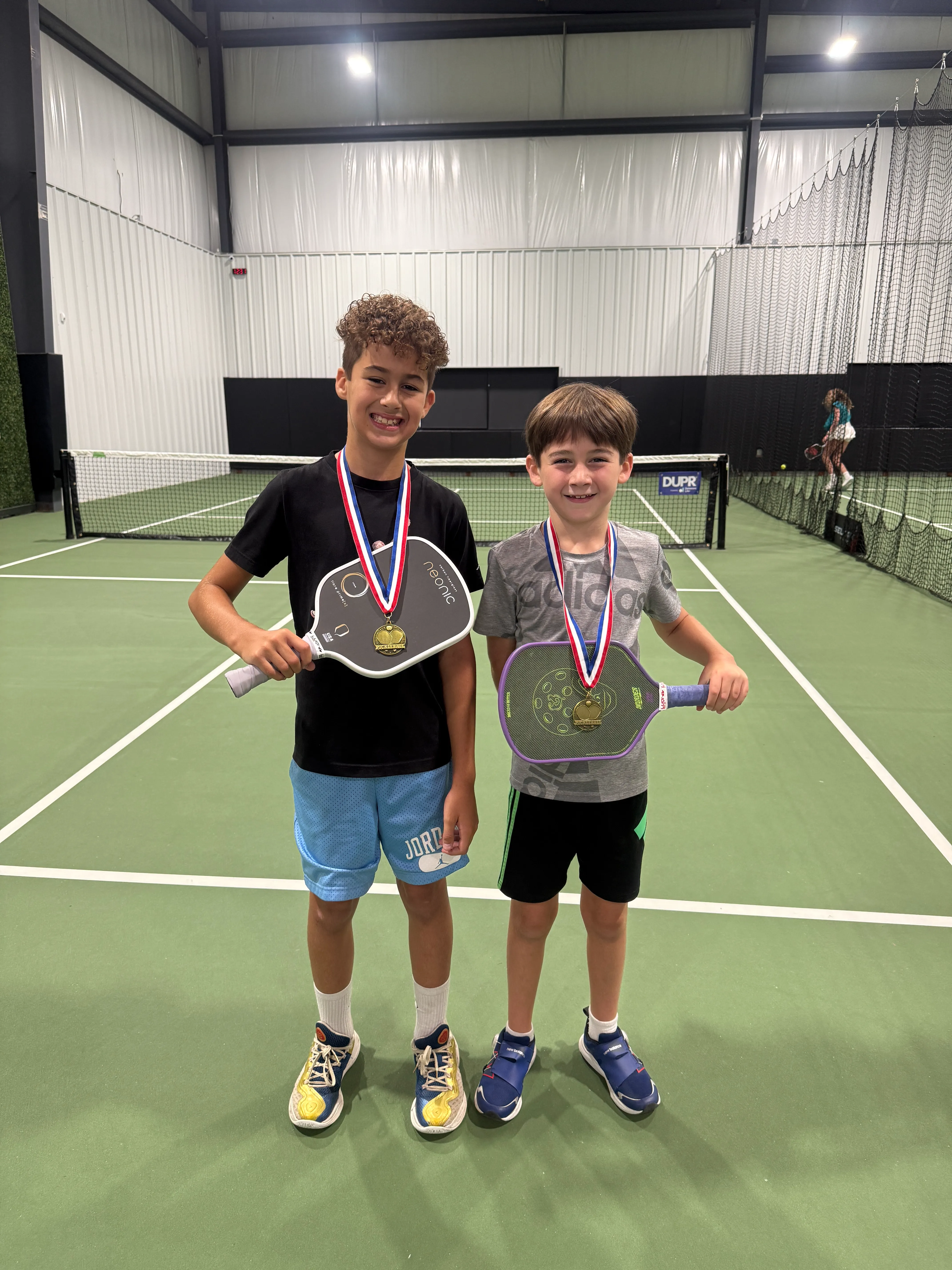 Happy kids at pickleball camp
